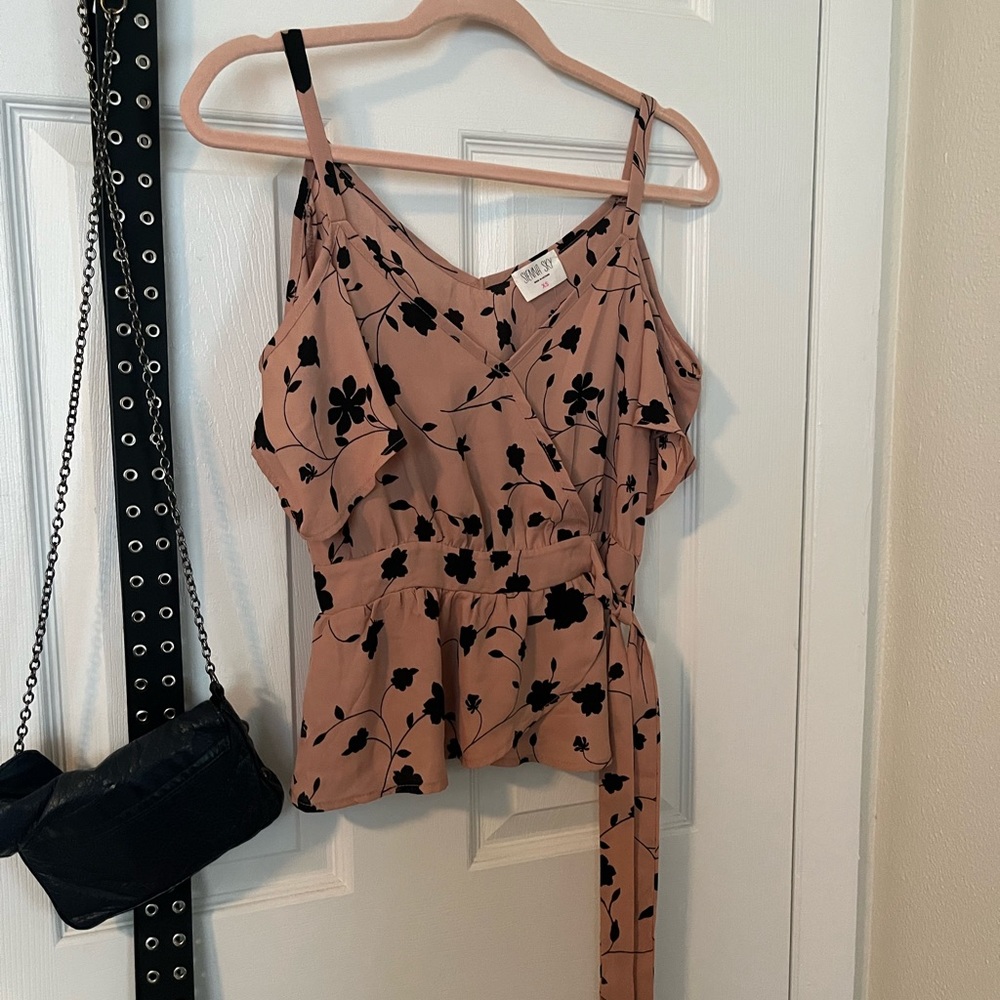 Pink and black cut out shoulder blouse. Business casual